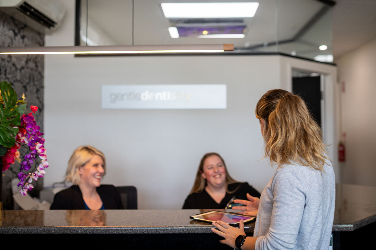 The Gentle Dentistry Adelaide team welcoming a patient